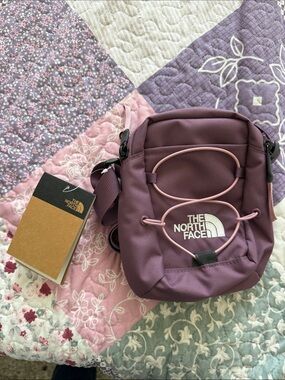 The North Face Midnight Mauve Jester Crossbody Bag with Pink Bungee Detail